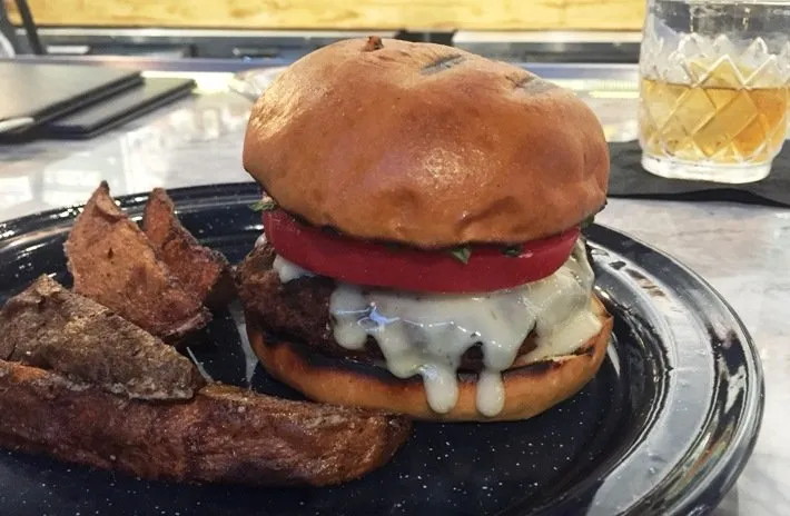 Lamb burger with fries at Whiskey Kitchen in Raleigh- NC Triangle Dining