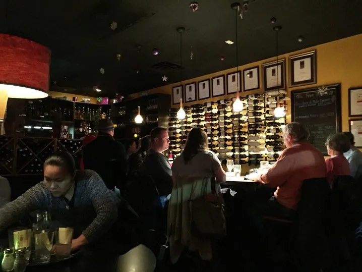 Bar at Bella Monica and its covered patio in Raleigh - NC Triangle Dining