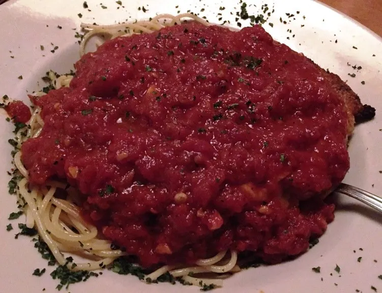 Chicken parmigiana at Bella Monica and its covered patio in Raleigh - NC Triangle Dining