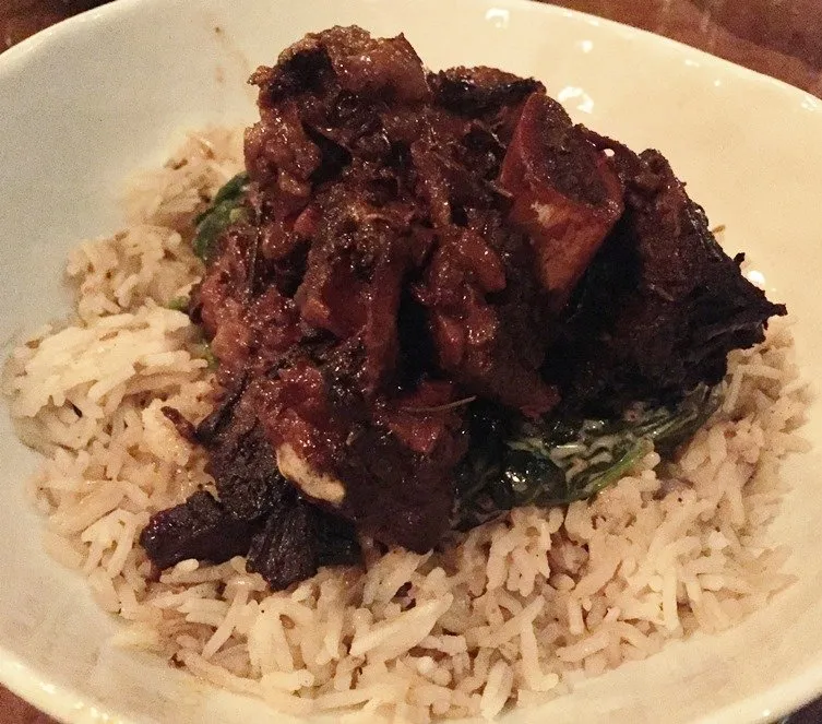 Short rib over spinach at Bar Virgile in Durham - NC Triangle Dining