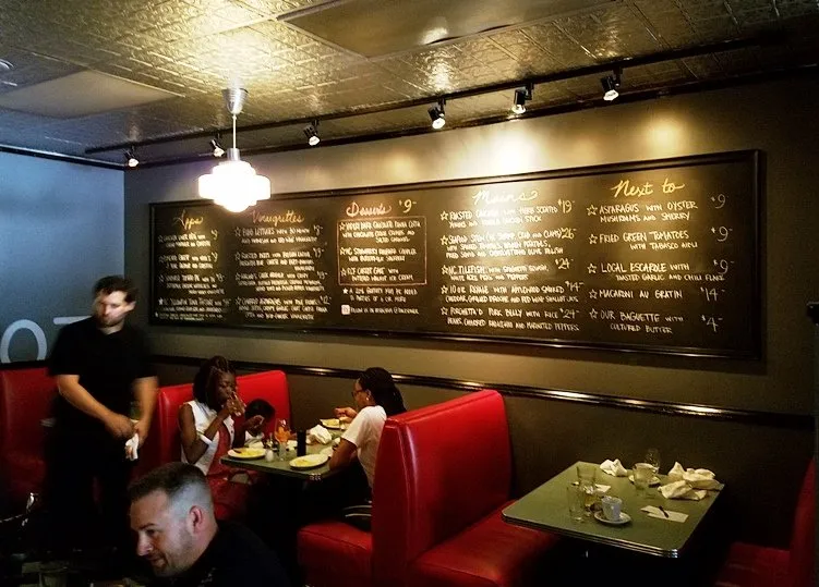 Seating and chalkboard menus at Poole's Diner in Raleigh - nctriangledining.com