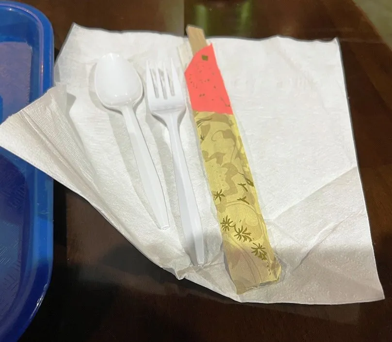 Plastic utensils, chopsticks and napkin at H Mart food court dining room in Cary - NC Triangle Dining