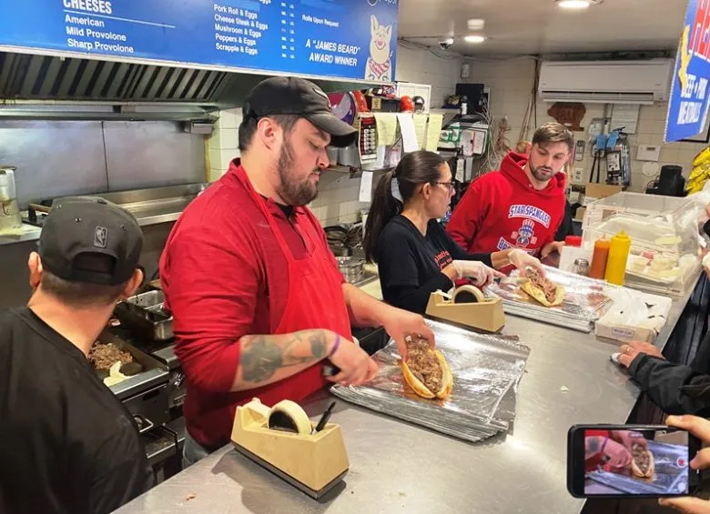 Busy counter at John's Roast Pork in Philadelphia - nctriangledining.com