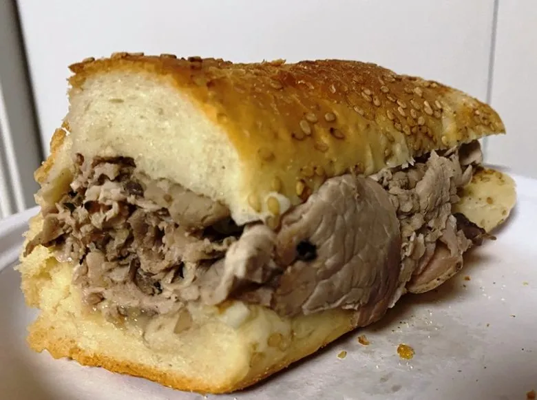 Roast pork sandwich close-up at John's Roast Pork in Philadelphia - nctriangledining.com