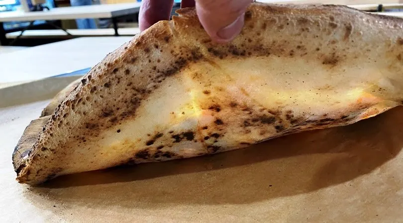 Pizza crust peek at Cugino Forno in Durham - nctriangledining.com