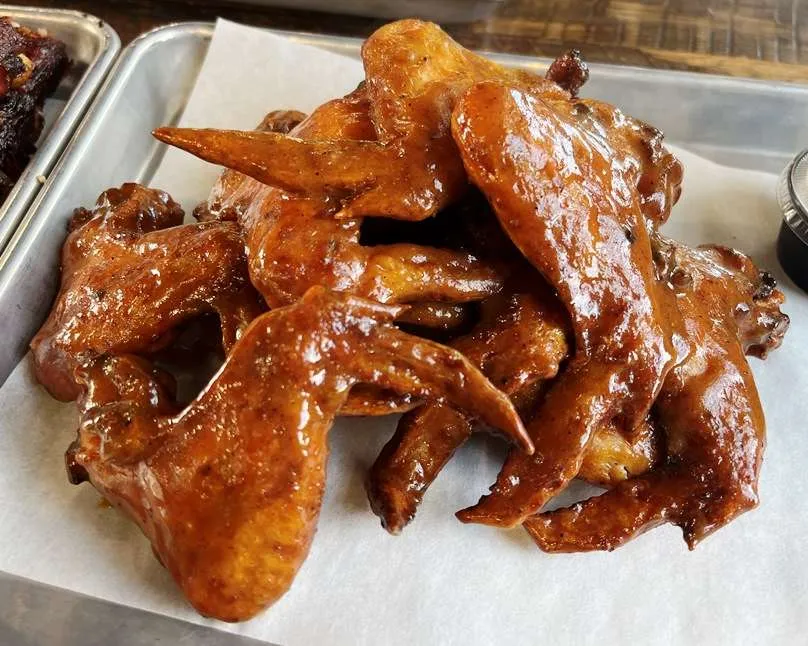 Smoked chicken wings with barbeque sauce at Longleaf Swine in Raleigh - nctriangledining.com