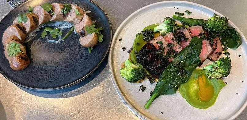 Kurobuta sausage and NY strip steak with broccoli at M Test Kitchen in Cary - nctriangledining.com