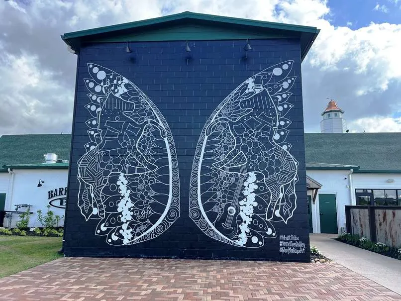 Angel wings mural at Nearest Green Distillery in Shelbyville, TN - nctriangledining.com