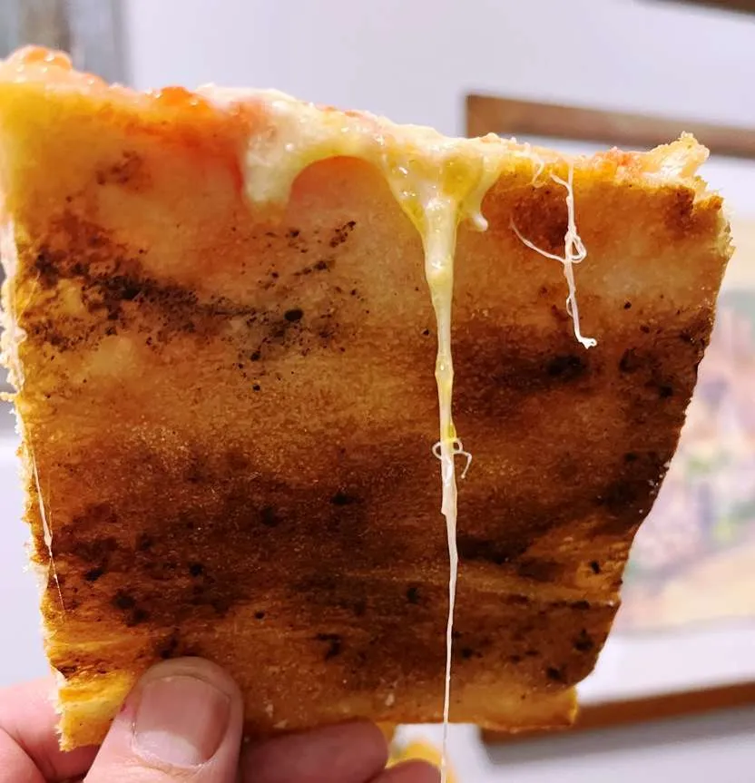Frasketta Pizza Romana crust peek - nctriangledining.com